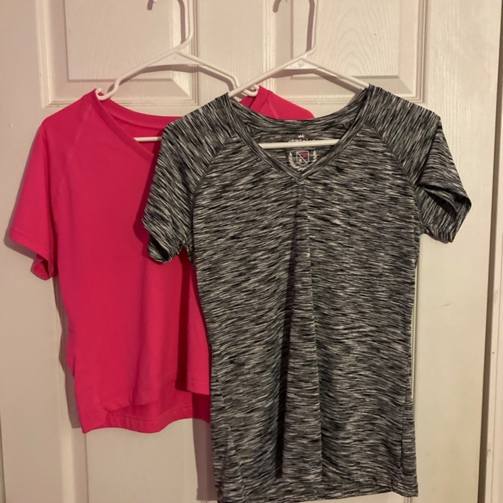 Two ladies athletic shirts